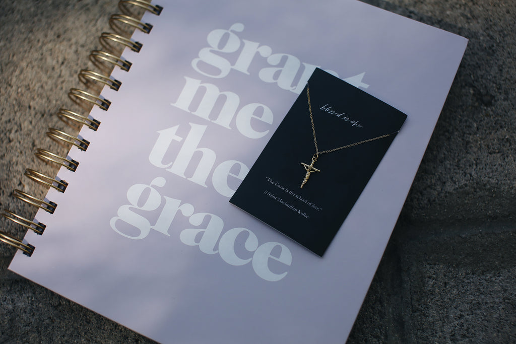 catholic gold necklace with liturgical planner