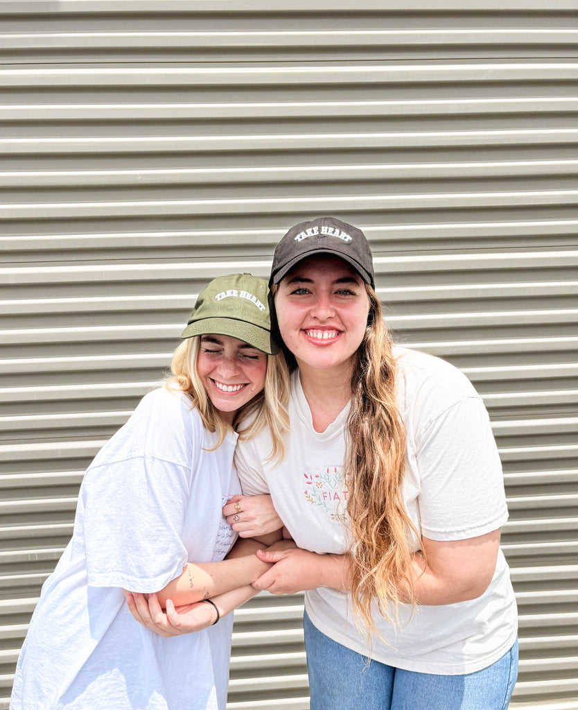 Take Heart Green and Black Dad Hats