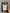 Book titled 'I Believe in Love' held by a hand with a blurred background