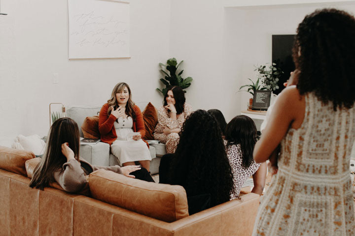 A group of women sitting together at a bible study